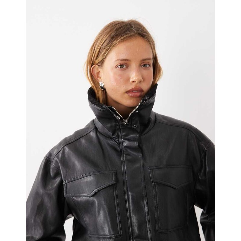 Mango funnel neck cinched waist faux leather jacket in black