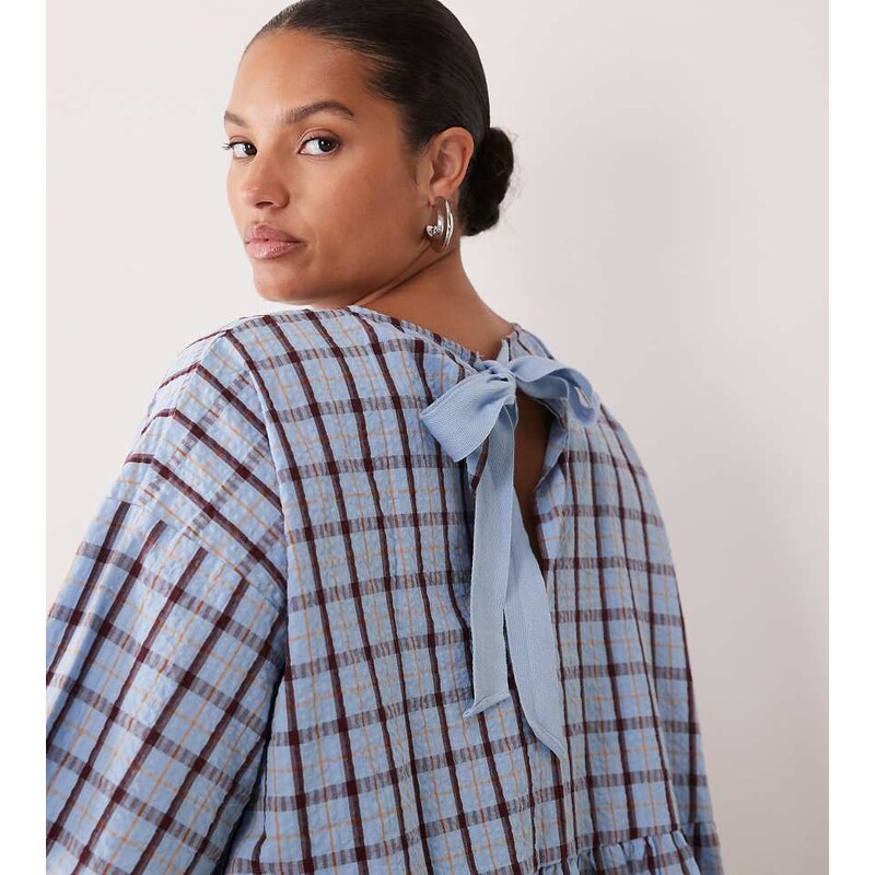 ASOS Curve ASOS DESIGN Curve oversized short sleeve peplum top