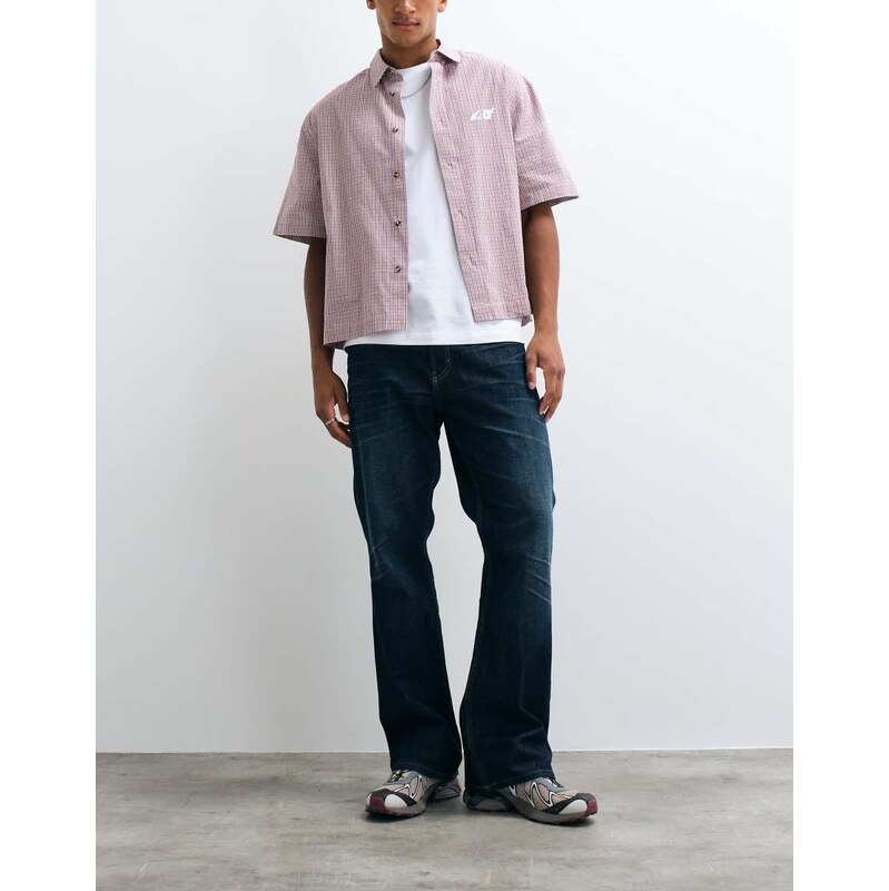 Weekday Mercury relaxed fit bootcut flare jeans in dark blue