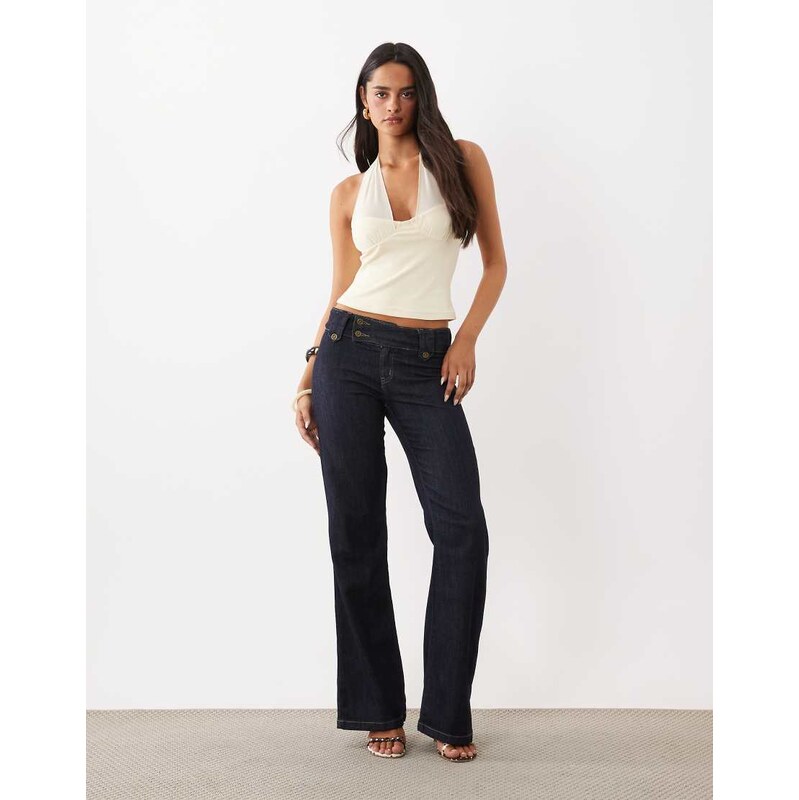 Tiger Mist Kittie low rise flared jeans in midwash blue