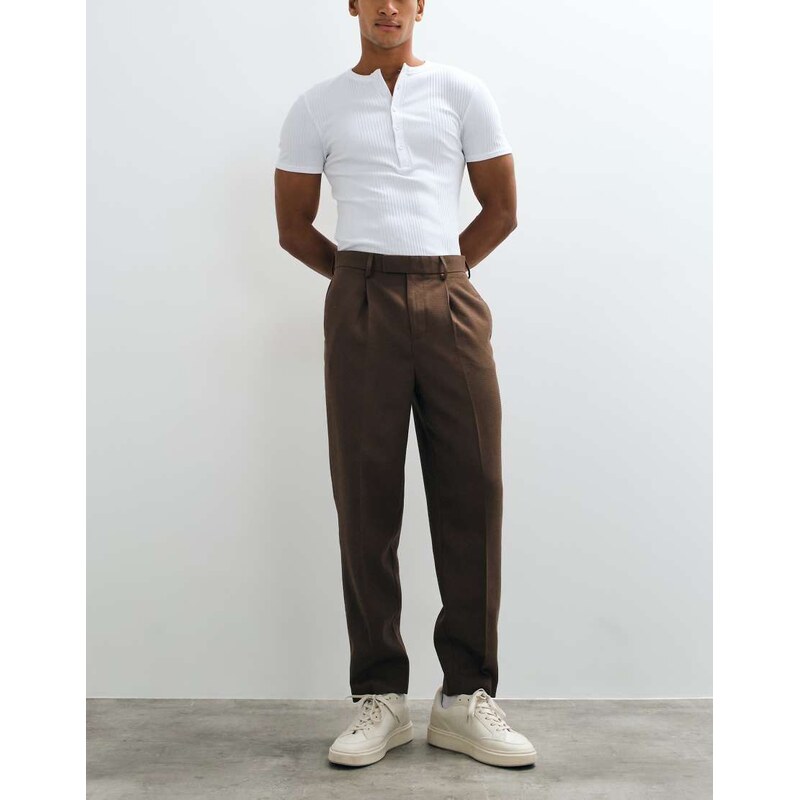 ASOS DESIGN tailored pleated relaxed tapered trousers in brown