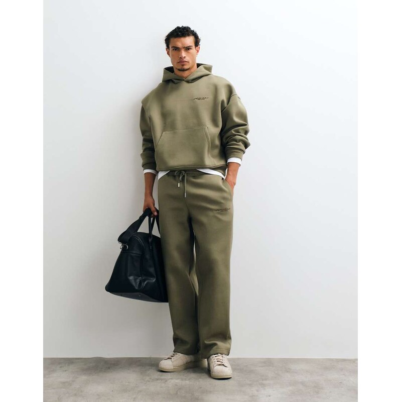 ASOS DESIGN wide leg scuba-style fabric jogger with embroidery