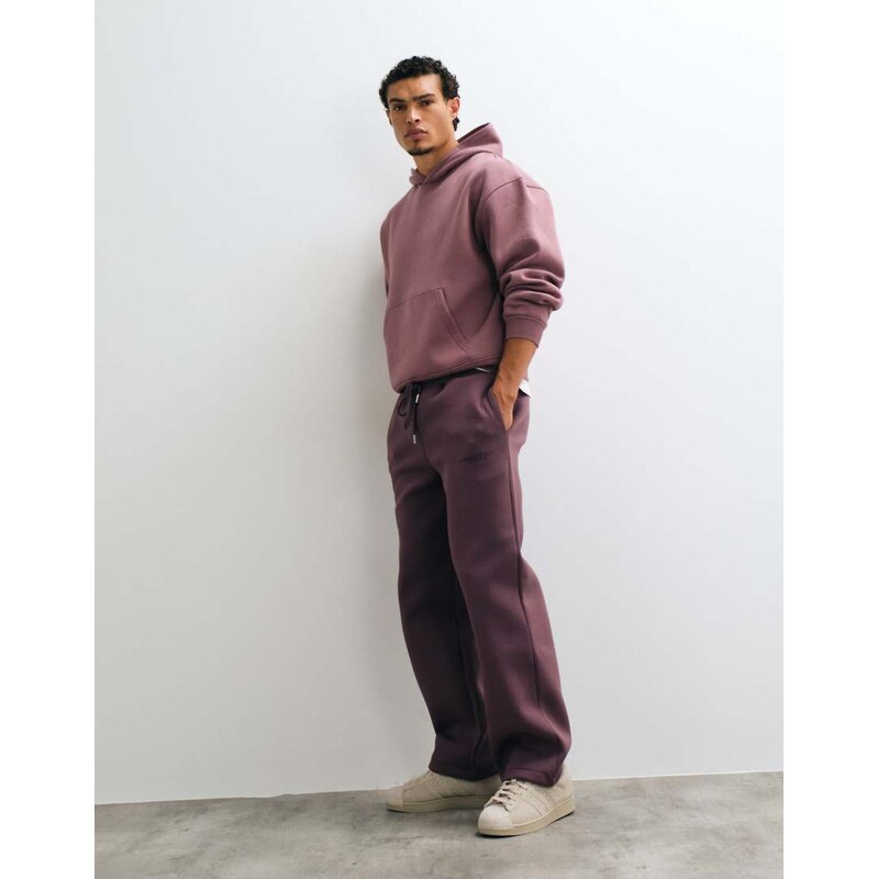 ASOS DESIGN wide leg scuba-style fabric jogger with embroidery