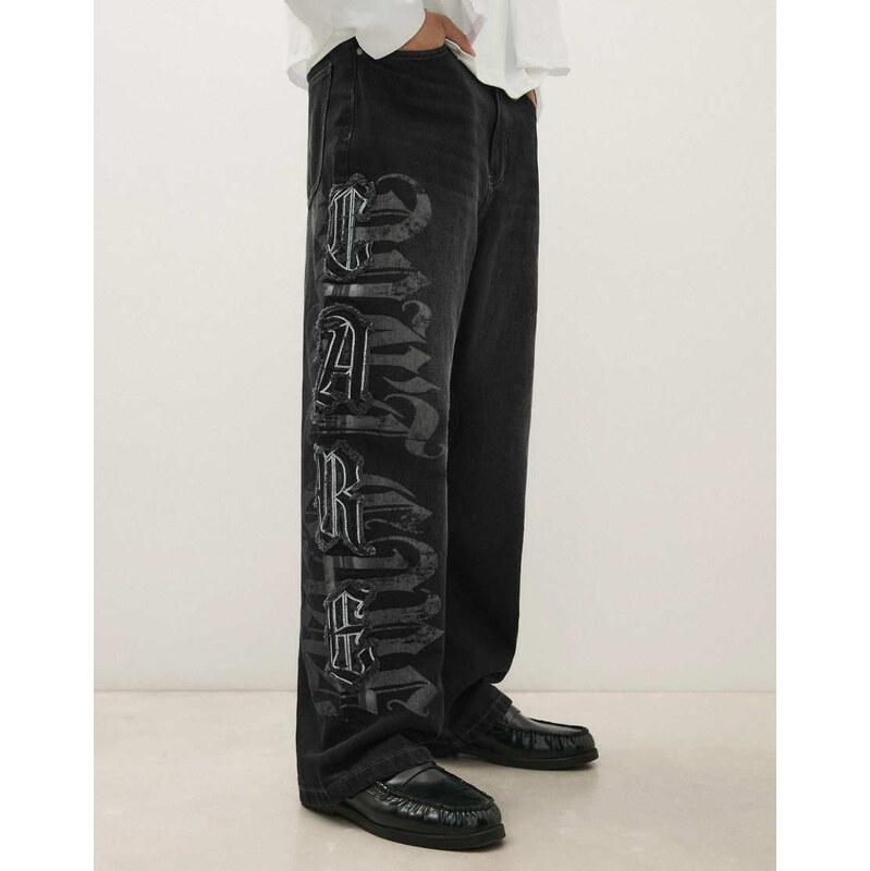 Bershka Baggy jeans with star patches in black
