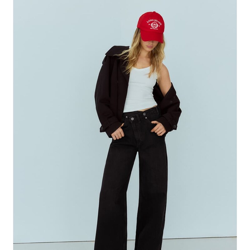 Bershka Petite wide-leg cross-waist jeans in black