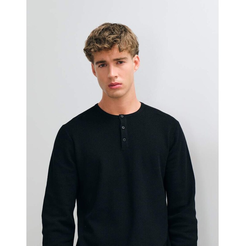 ASOS DESIGN relaxed knitted long sleeved texture henley in black