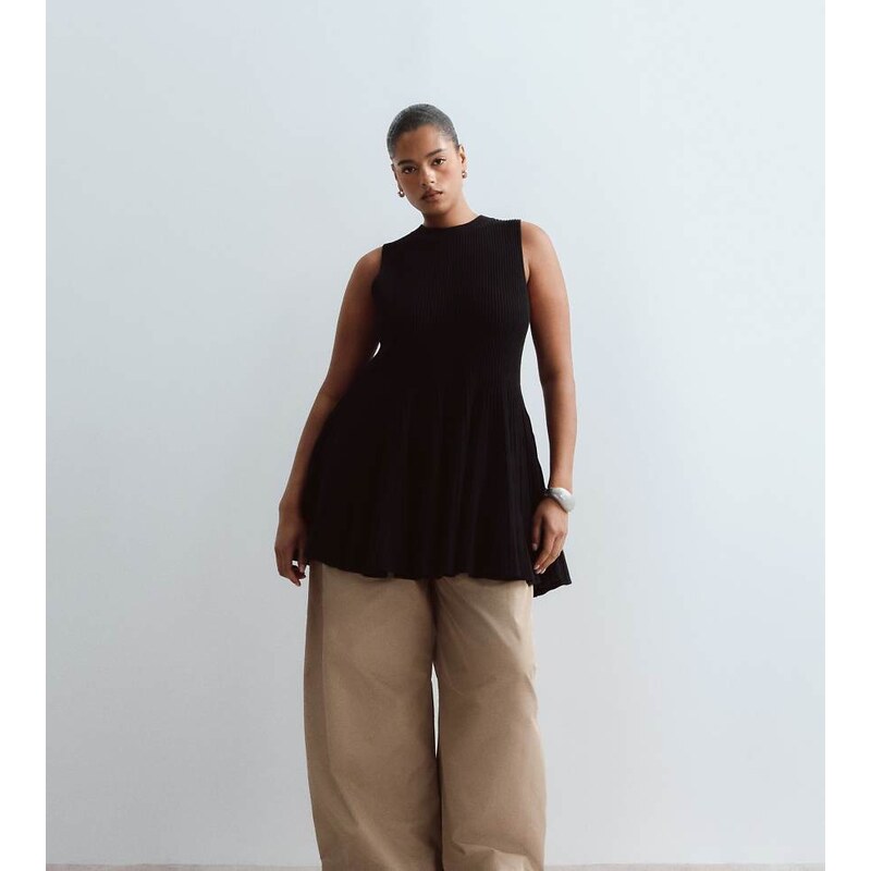 ARRANGE Curve knitted sleeveless peplum top in black
