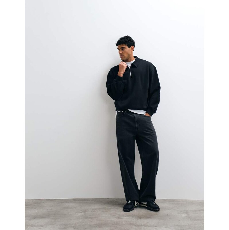 ASOS DESIGN oversized boxy polo with quarter zip in black