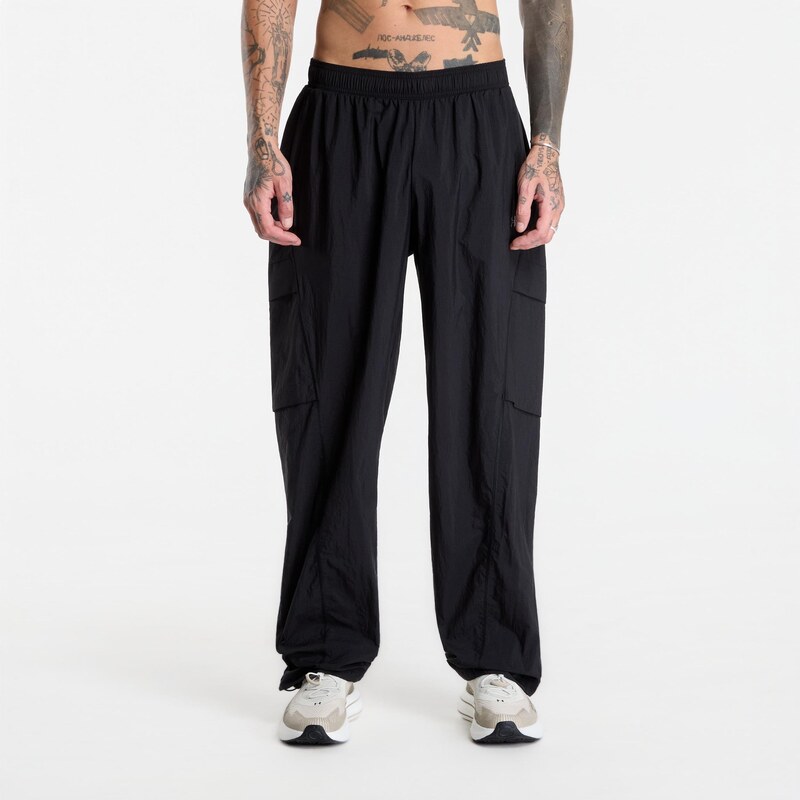 Kalhoty Under Armour Unstoppable Woven Pant Solid Black S
