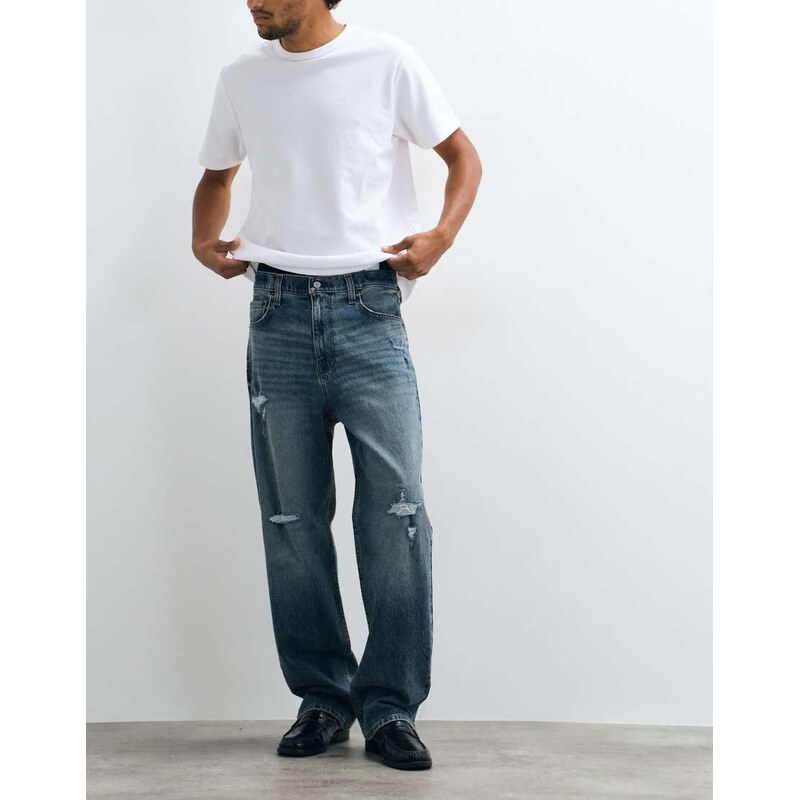 Hollister super baggy fit jeans with distress detail in dirty