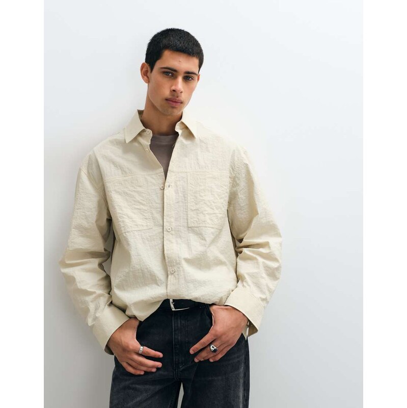ASOS DESIGN oversized shirt with double pockets in cream-White