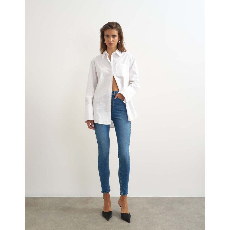 Topshop Jamie high rise skinny jean in mid blue
