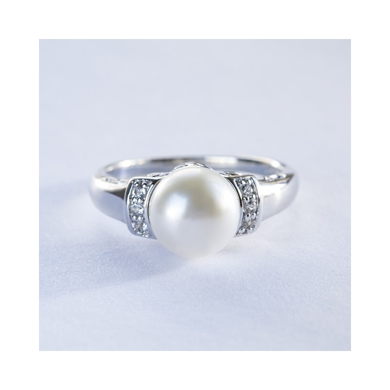 Stříbrný prsten s perlou a topazy KLENOTA
