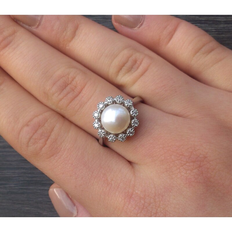 Meucci Stříbrný prsten s perlou v kytičce zirkonů