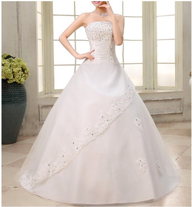 PlesovaModa.cz luxusní svatební šaty krémové Donna Barva: Krémová, Velikost: L