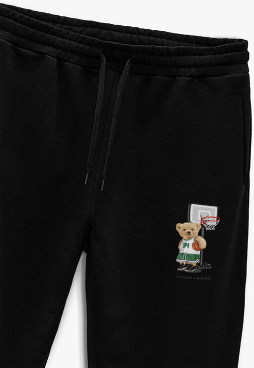 Tepláky Jogger , Barva Černá, s Potiskem Living Legend Teddy