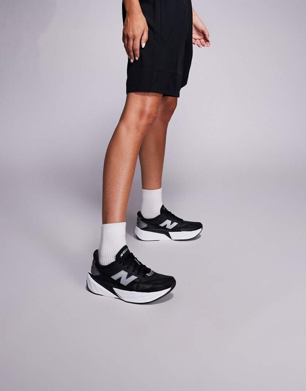 New Balance Fuelcell Rebel v5 womens running trainers in black-Yellow