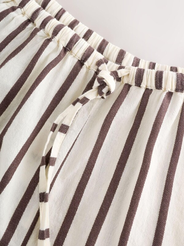 Next Kalhoty světle béžová / čokoládová