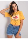 Fashionhunters Světle oranžové dámské tričko s potiskem a nášivkami