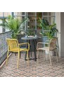 Hořčicově žlutá plastová zahradní židle Kave Home Isabellini