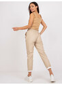 Fashionhunters Béžové kalhoty z ekokůže s kapsami Lana