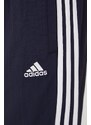 Tepláky adidas Essentials dámské, tmavomodrá barva, vzorované