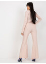 Fashionhunters Světle růžové široké úpletové kalhoty s rozparkem