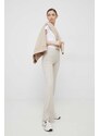 Bavlněná mikina Calvin Klein dámská, béžová barva, s aplikací