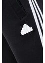 Tepláky adidas černá barva, s aplikací