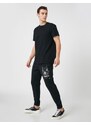 Koton Jogger Sweatpants with a skull print, zippered pockets, Lace-Up Waist.