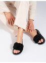 Black flip-flops on the Shelovet platform