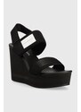 Sandály Calvin Klein Jeans WEDGE SANDAL BADGE dámské, černá barva, na klínku, YW0YW01028