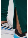 Tepláky adidas zelená barva, s aplikací
