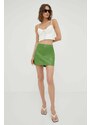 Kožená sukně Remain zelená barva, mini, pouzdrová