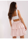 Fashionhunters Světle růžová rozevlátá pletená sukně