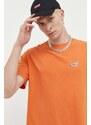 Bavlněné tričko Tommy Jeans oranžová barva