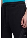 Bavlněné tepláky C.P. Company Jogging Pant černá barva, 14CMSP084A005086W999-BLACK