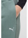 Tréninkové kalhoty Puma Evostripe zelená barva, hladké