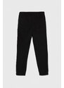 Dětské tepláky Calvin Klein Jeans černá barva, s aplikací