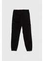 Dětské bavlněné kalhoty Guess černá barva, hladké