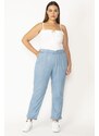 Şans Women's Blue Fabric Trousers with an elastic waist, side pockets and double legs.