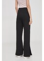 Bavlněné tepláky Calvin Klein Jeans černá barva, s potiskem