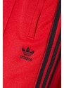 Tepláky adidas Originals červená barva, s aplikací, IM9809