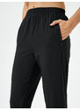 Koton Jogger Sweatpants with Elastic Waist and Legs, Zippered with Pocket.