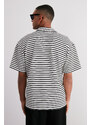 Trendyol Ecru Oversize/Wide Cut Limited Edition Striped Textured Polo Collar T-shirt