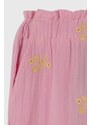 Dětské bavlněné kalhoty Guess růžová barva, vzorované