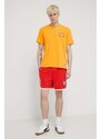 Bavlněné tričko Tommy Jeans Archive Games žlutá barva, s potiskem, DM0DM19545
