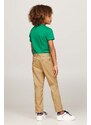 Dětské kalhoty Tommy Hilfiger žlutá barva, hladké