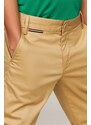 Dětské kalhoty Tommy Hilfiger žlutá barva, hladké