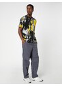 Koton Parachute Trousers with a loose fit, lacing at the waist, and elasticated legs with a pocket detail.